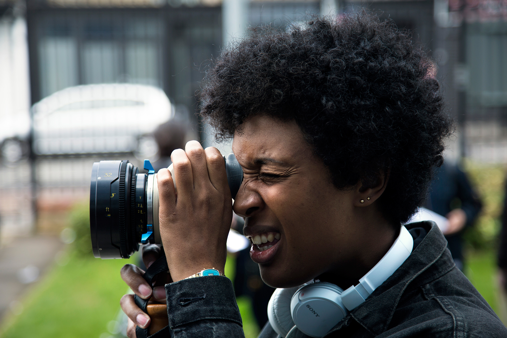 Behind the scenes on We Love Moses, the cinematographer operating the camera on the street