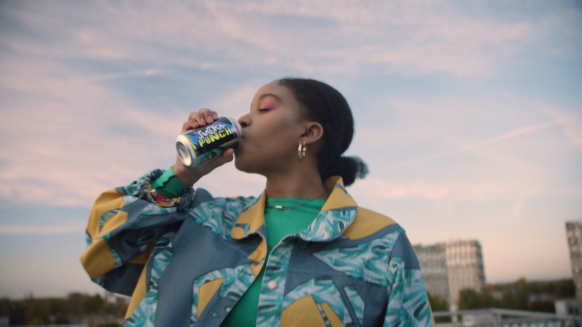 Still from Sucka Punch, Rods drinking a can of energy drink against an evening sky